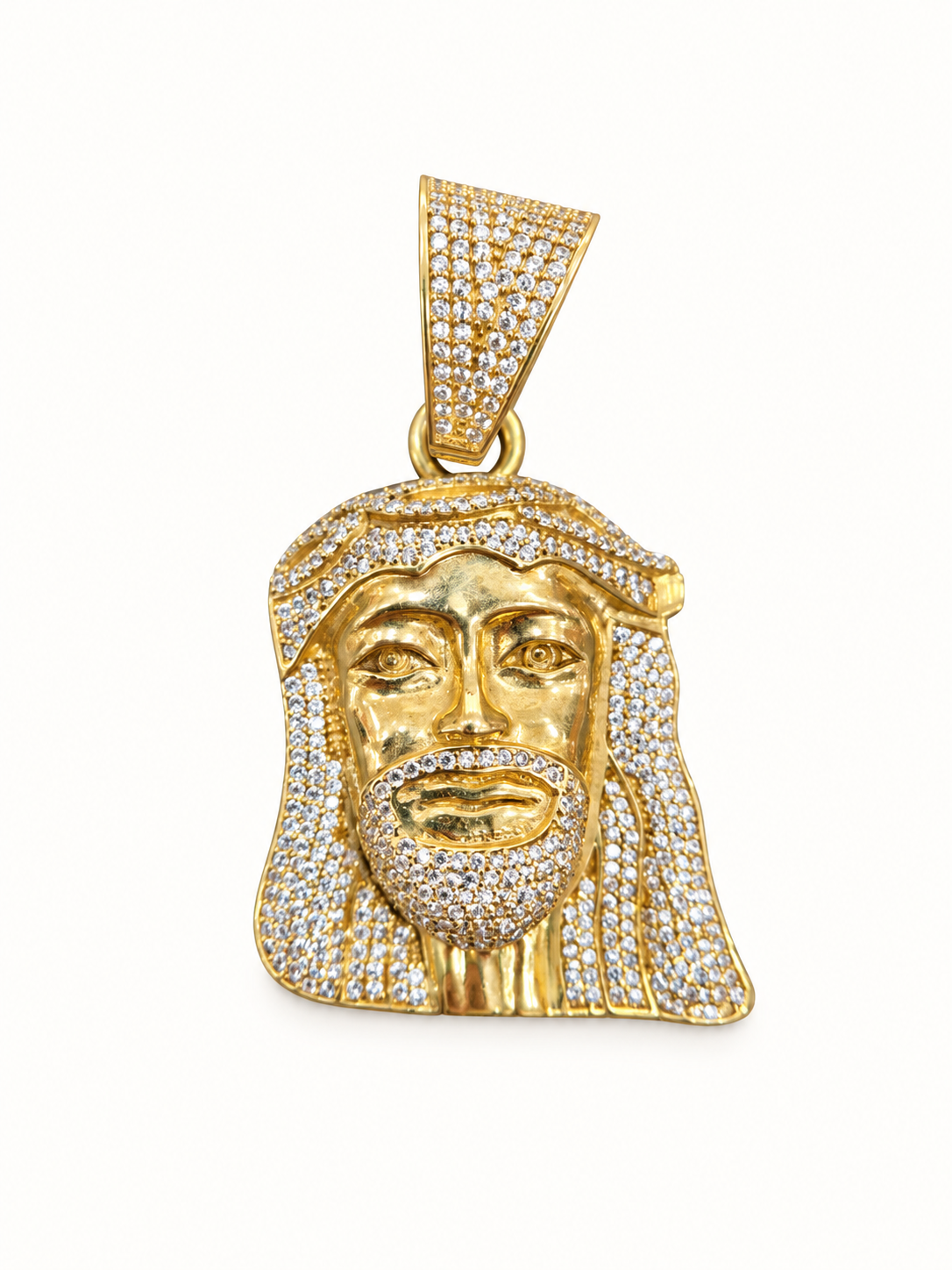 9ct gold pendant on ivory background