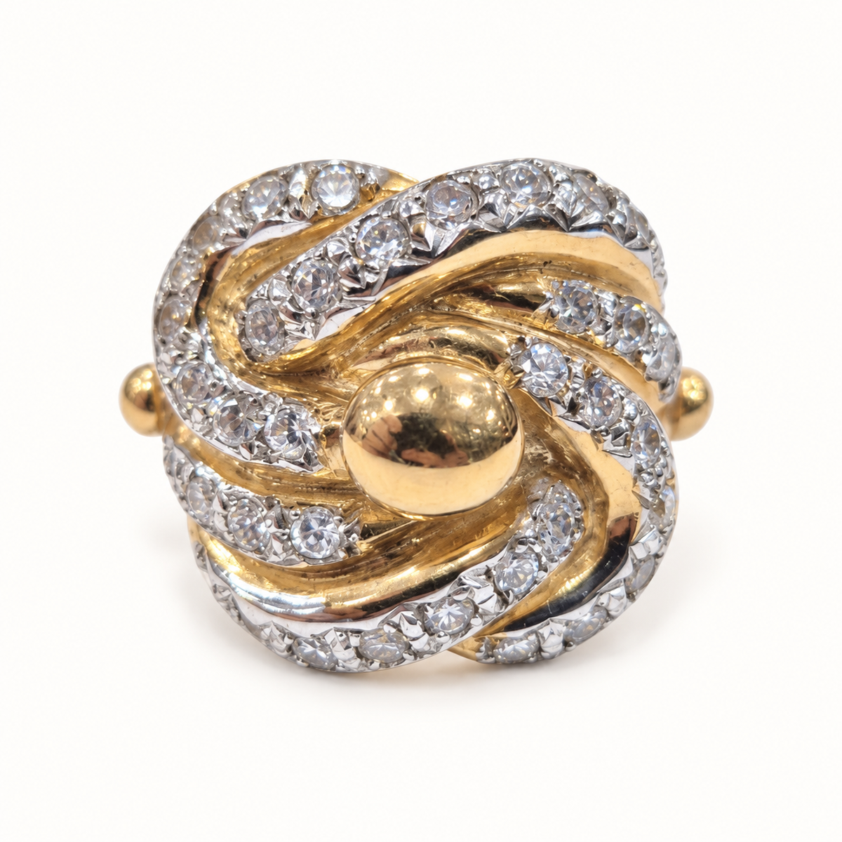 9ct Gold Heavy CZ Knot Ring – 91.5g, front view on ivory