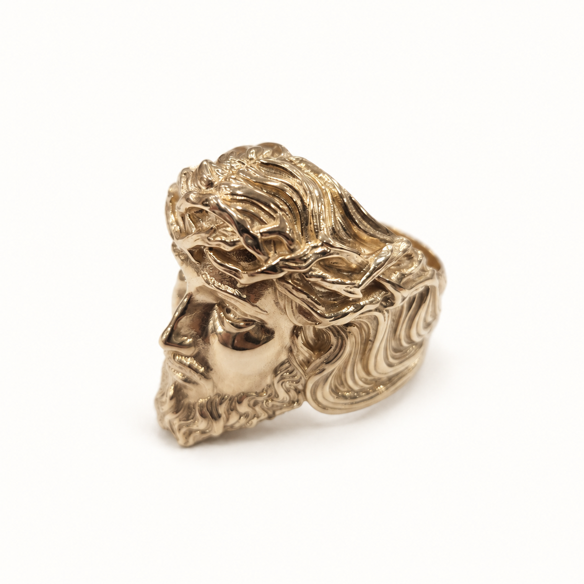 Men's 9ct yellow gold ring, side view on ivory