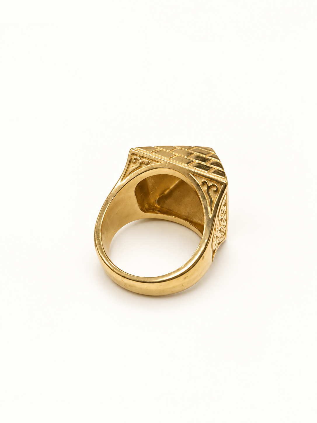 Men's gold geometric signet ring, rear and band view on pale ivory