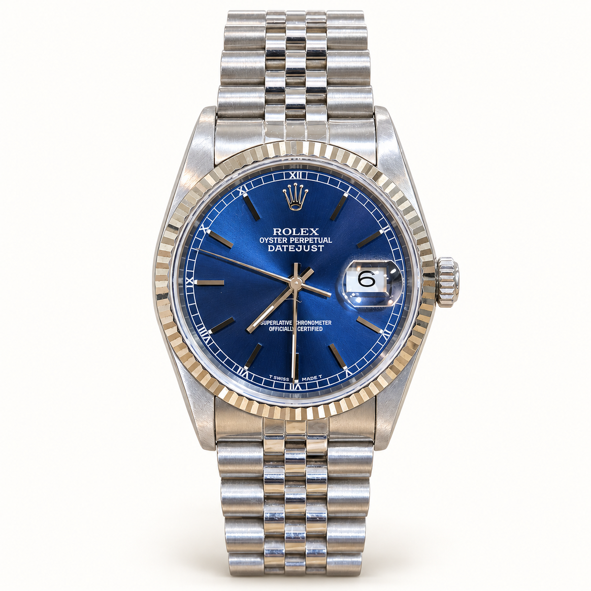 Pre-owned Rolex Datejust 16234 1991 blue dial steel Jubilee bracelet on ivory background
