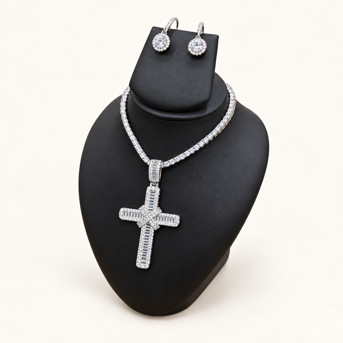 Silver CZ cross set on black bust with Cross 1 pendant, tennis necklace and drop earrings