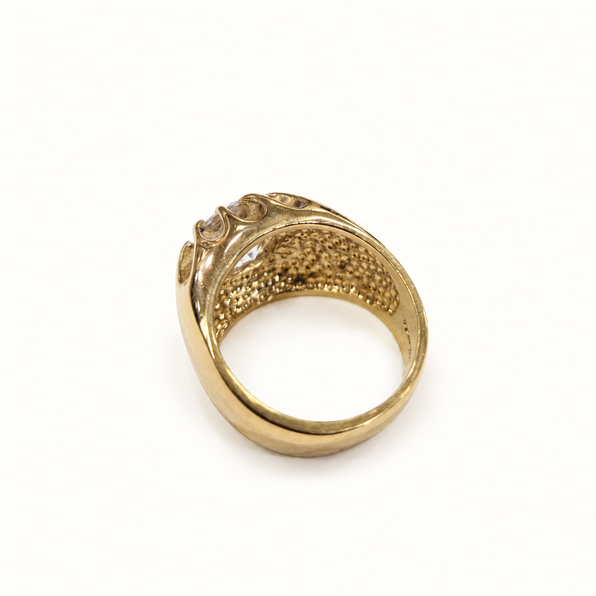 Men's 9ct yellow gold ring, rear view on ivory