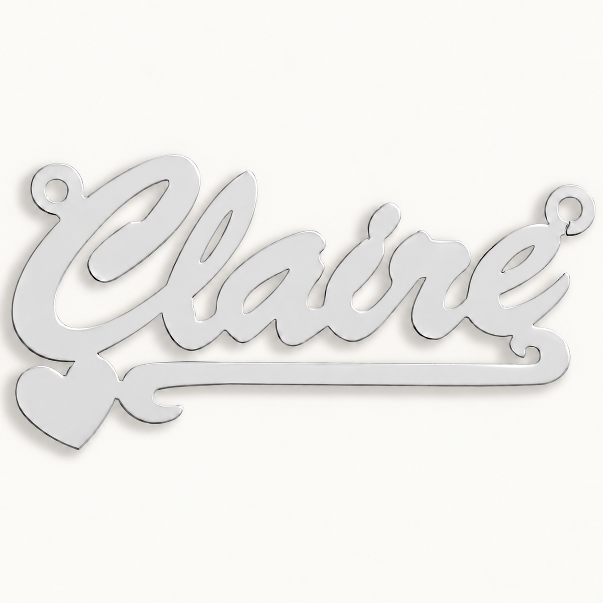 Sterling silver Script Heart Scroll personalised nameplate, example Claire, illustrative image on pale off-white background