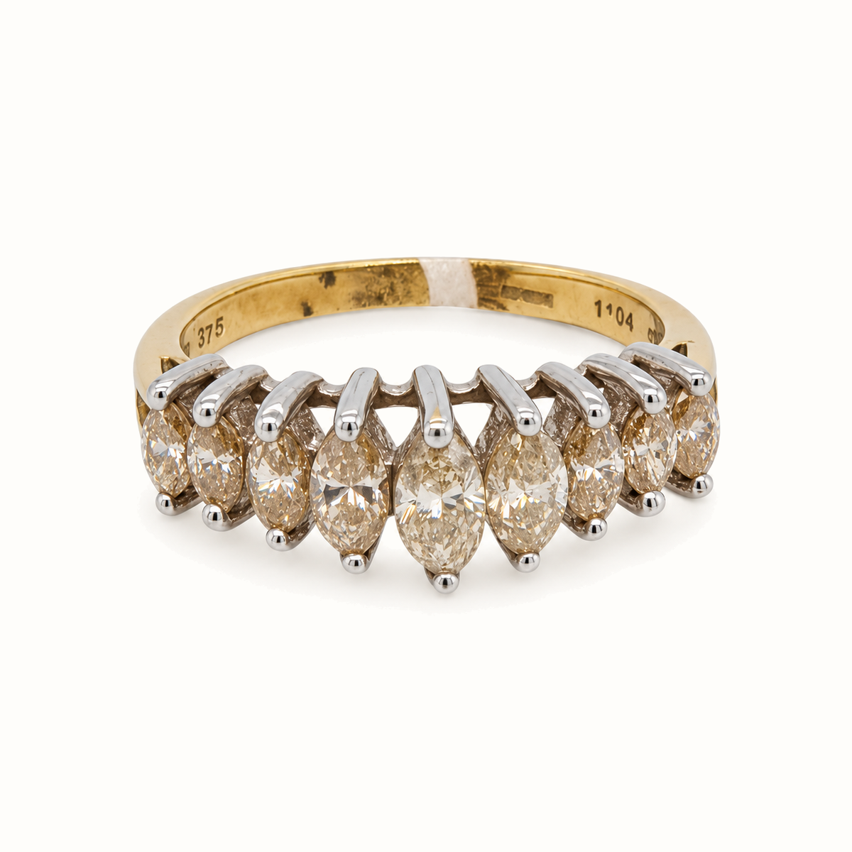 9ct Yellow Gold Diamond Ring with 1.04ct diamonds, size P, on an ivory background