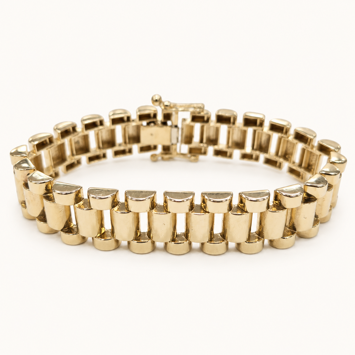9ct yellow gold plain Presidential bracelet BR0630, curved view on ivory