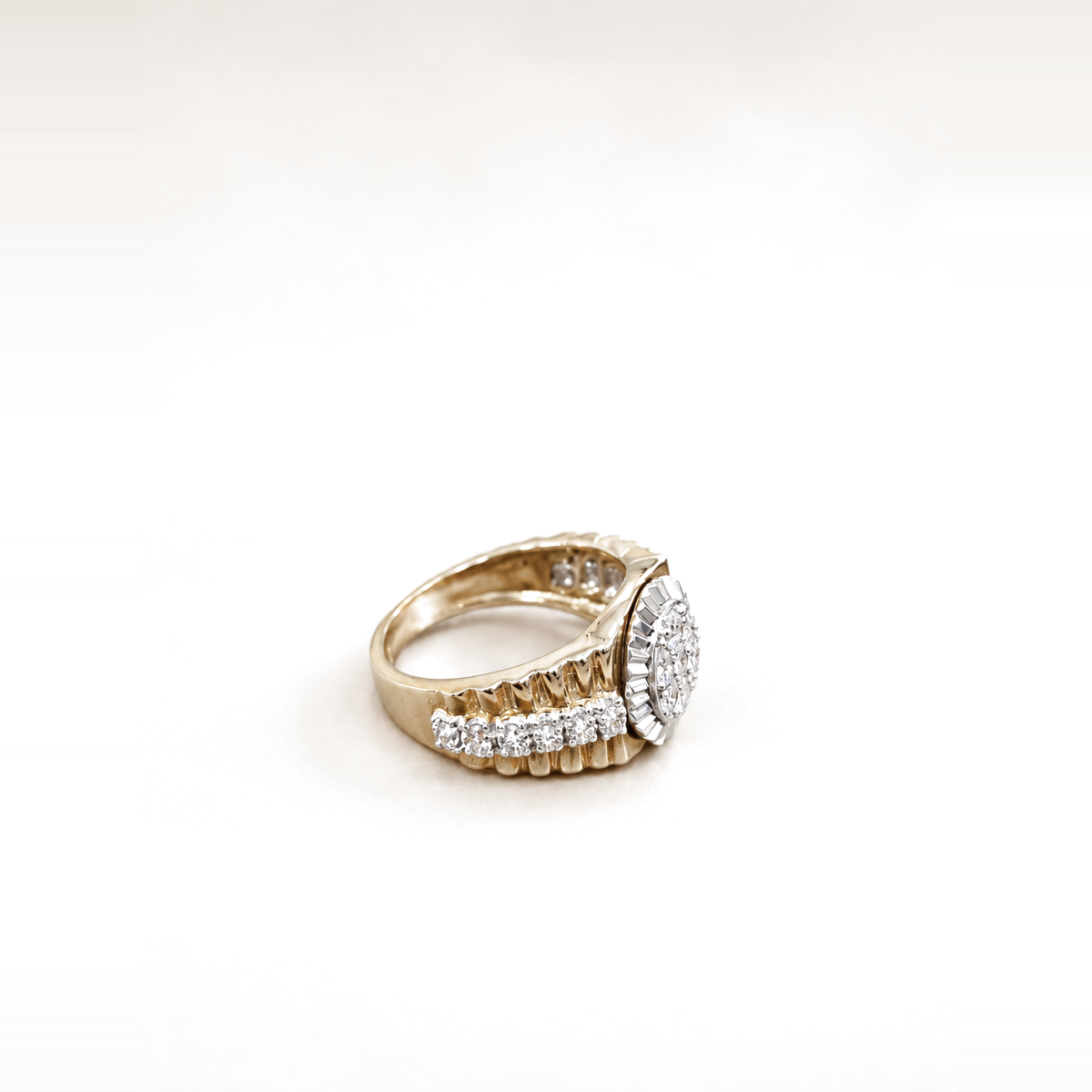 Side view of 9ct gold Presidential Style fluted CZ ring with side stones on light ivory
