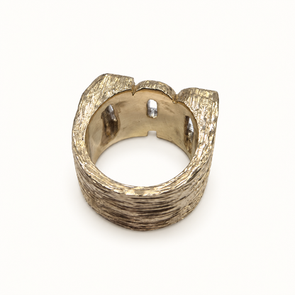 Men's 9ct gold ring, rear view on ivory