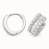 Medium silver CZ hoop earrings on pale ivory
