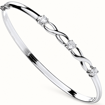 9ct white gold three-stone CZ bangle