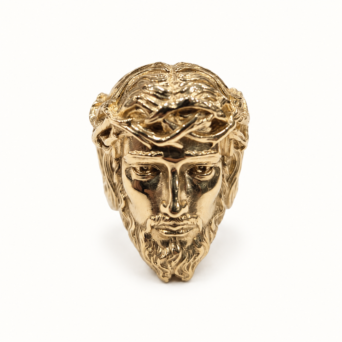 Men's 9ct yellow gold ring, front view on ivory