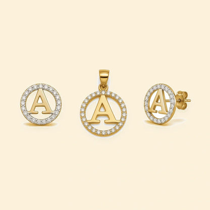 Gold plated sterling silver CZ initial A pendant set on ivory background