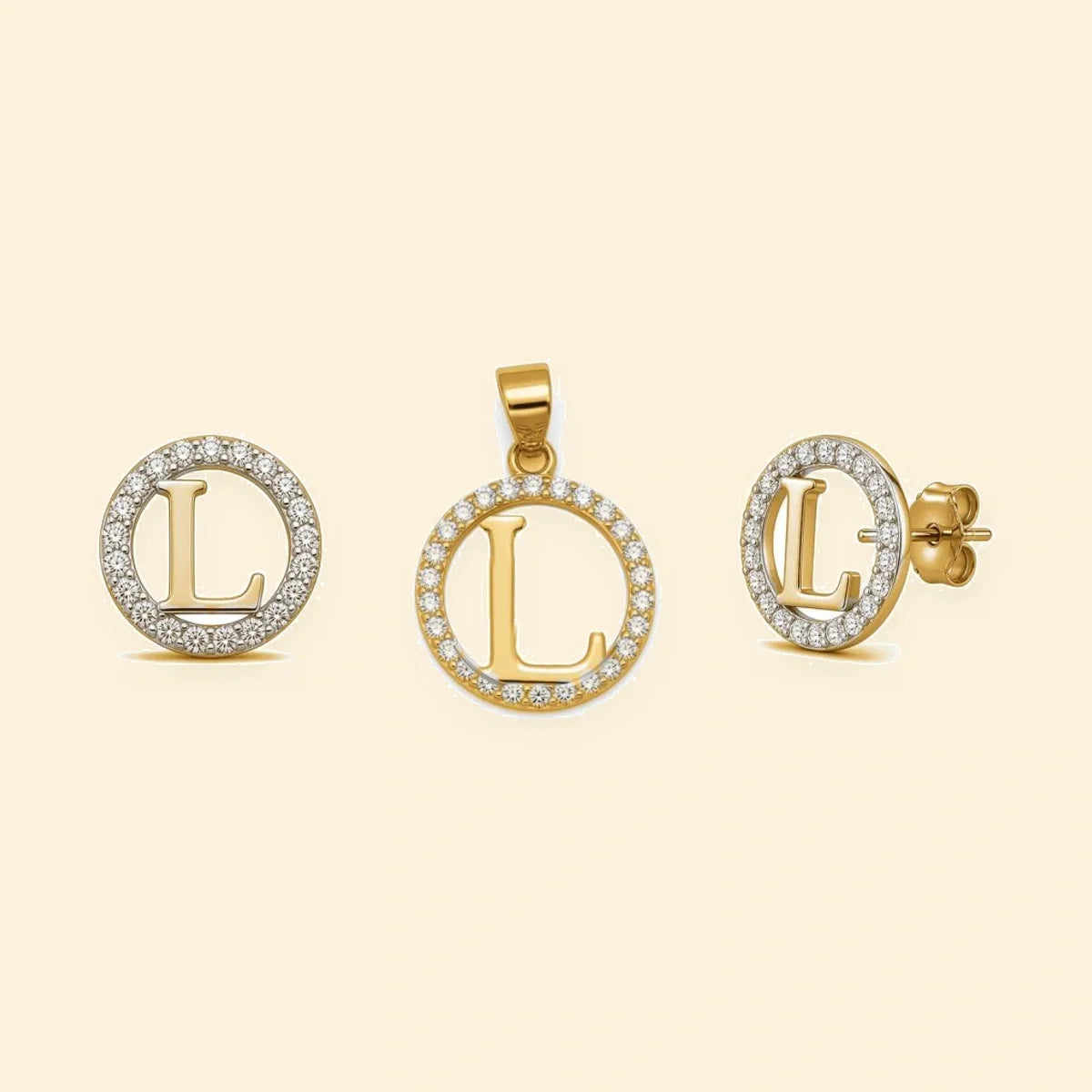 Gold plated sterling silver CZ initial L pendant set on ivory background