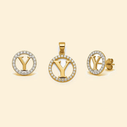 Gold plated sterling silver CZ initial Y pendant set on ivory background