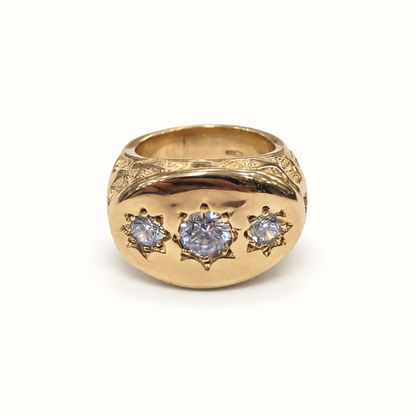 Men's 9ct yellow gold ring, front view on ivory