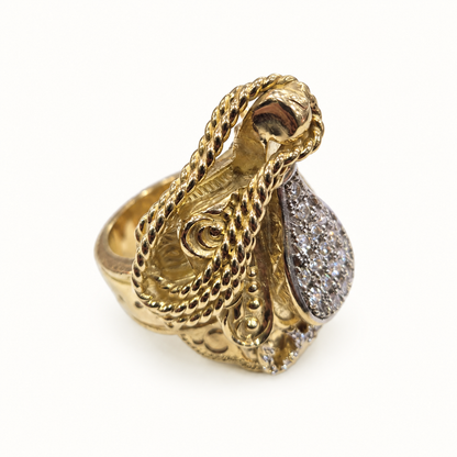 9ct Gold Saddle Rope CZ Ring – 90.1g – left view on ivory background